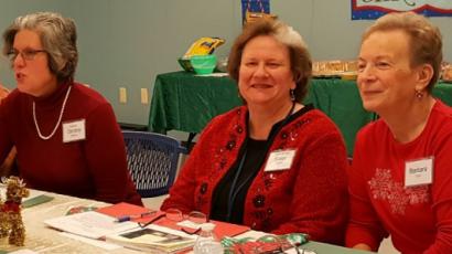Friends Holiday Luncheon: (from left to right) President Dorothy Holtzman, Branch Manager Susan Gardiner, Treasurer Barbara Guzzi