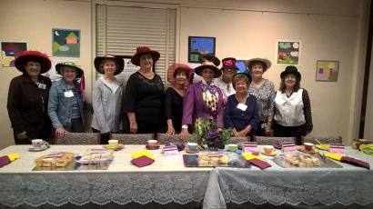 The Lacey Friends at their Mad Hatter Tea Table for Lacey’s 40th Anniversary